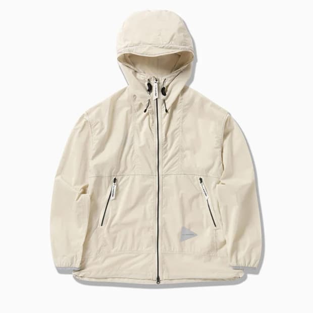 and wander 퍼텍스 바람막이 offwhite