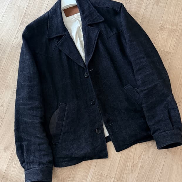 The letters 25aw 렌치 자켓 판매 42(L)