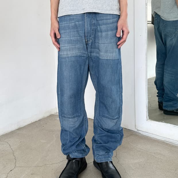 비비안 웨스트우드 커브드 패널 데님 팬츠