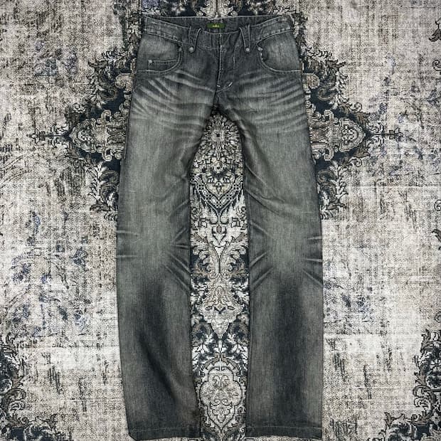 Obelisk stone washing bootscut jeans