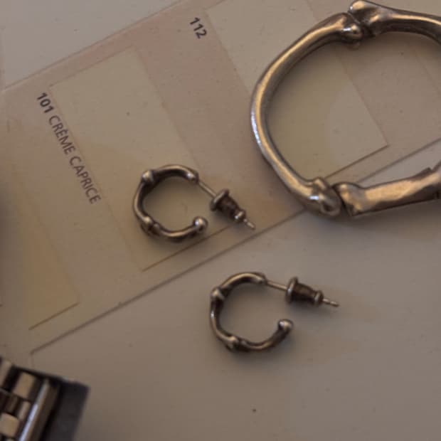 솔로이스트 본 이어링 한쌍