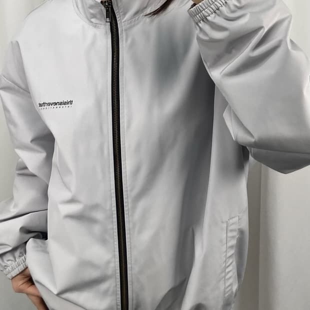 디스이즈네버댓 그레이 바람막이 자켓