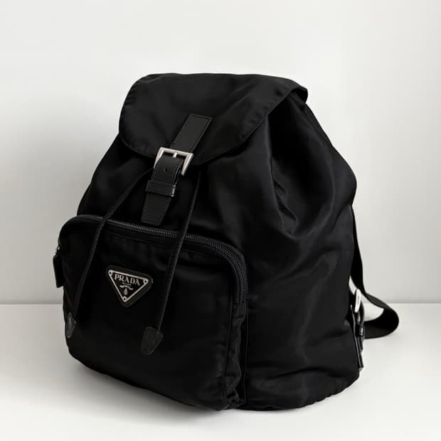 PRADA 프라다 삼각 플레이트 원포켓 백팩