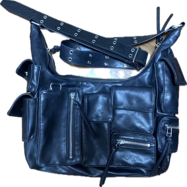 schism inducing leather bag