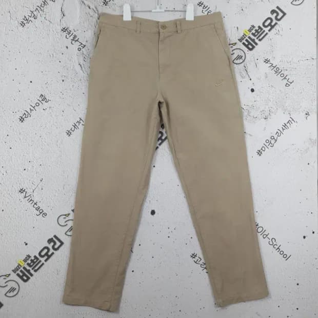 나이키 NIKE 퓨추라 면 자수 바지 베이지 34X32 4300011