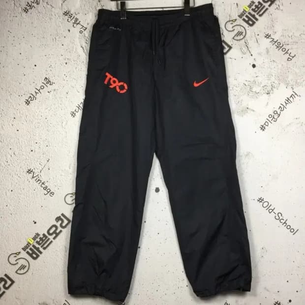 나이키 스톰핏 T90 우븐 와이드 트랙 운동바지 블랙 90 4400110