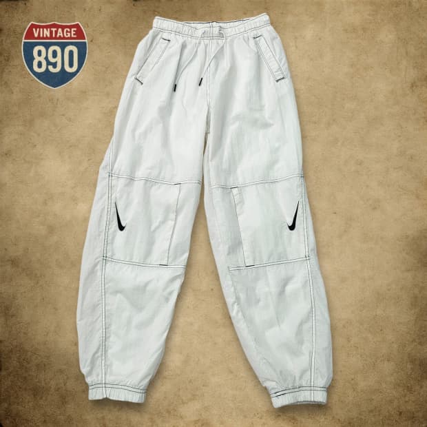 [S] NIKE 나이키 스우시 리펠 조거 팬츠