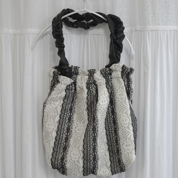 Lace hand shirring bag
