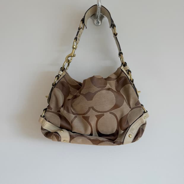 코치(COACH) 모노그램 숄더백