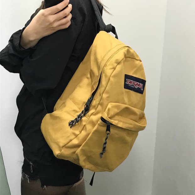 잔스포츠 옐로우 백팩