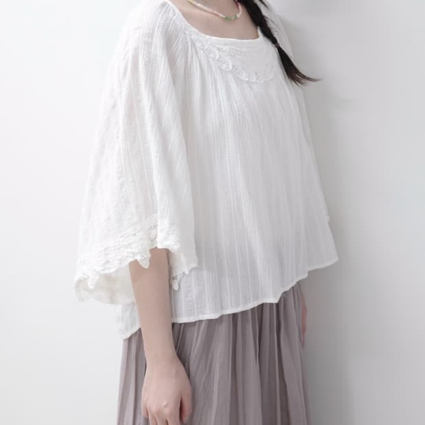 White cape blouse
