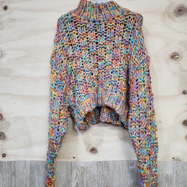 585) 어나더타입 그물 니트