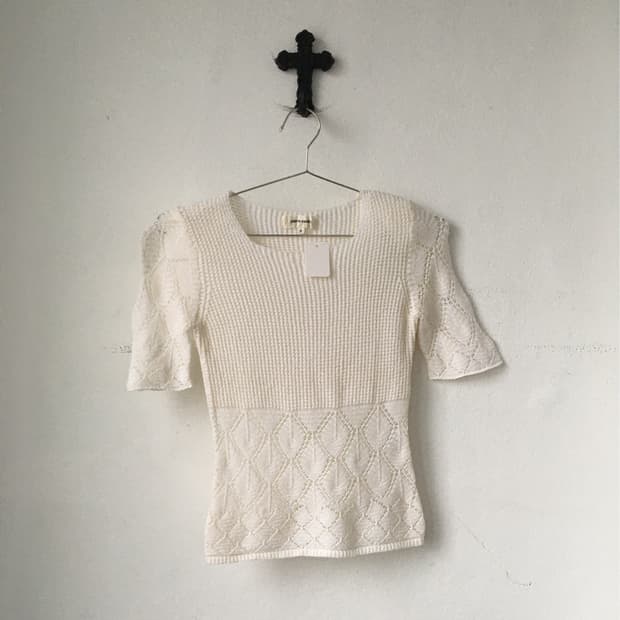 Punching pattern layer knitted top
