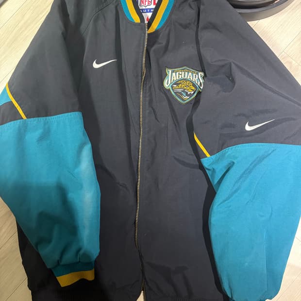 나이키 X nfl 젝슨빌 재규어 패딩 자켓