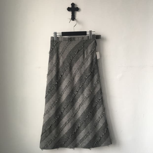 Fringe line point long skirt
