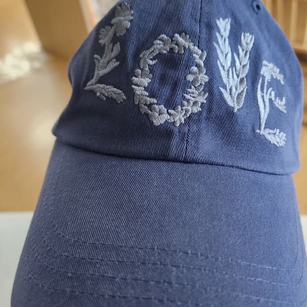 어나더오피스 모자