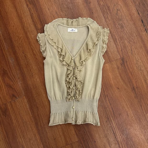 Gold Ruffle Button Sleeveless