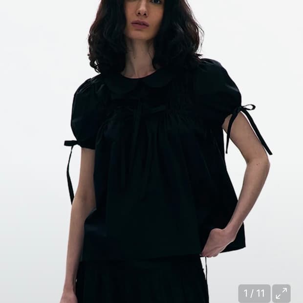 파르티멘토 우먼 오픈 백 리본 퍼프 블라우스 