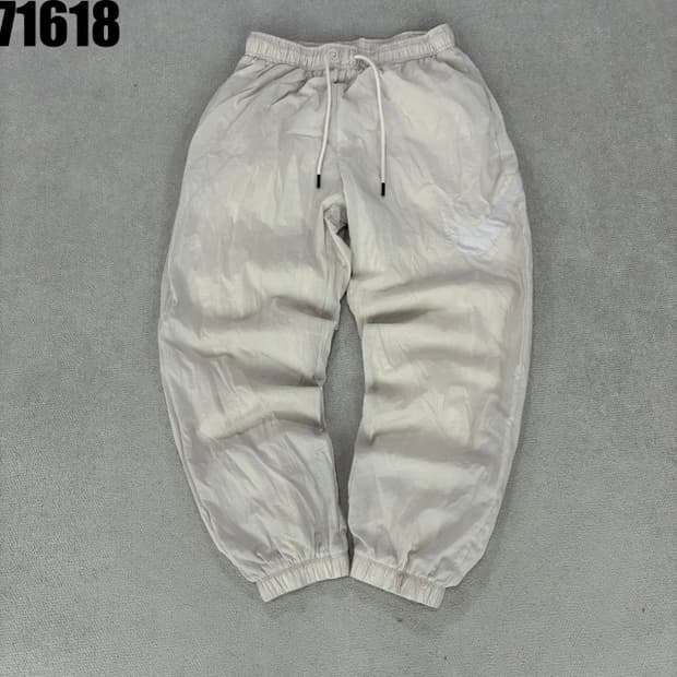 나이키 스우시 웜업 베이지 팬츠