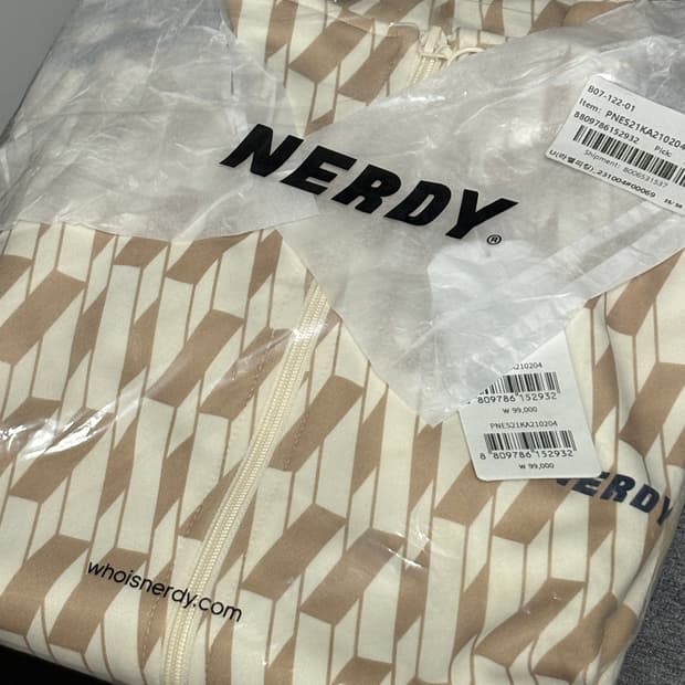 널디 심볼 패턴 트랙탑 (크림색)