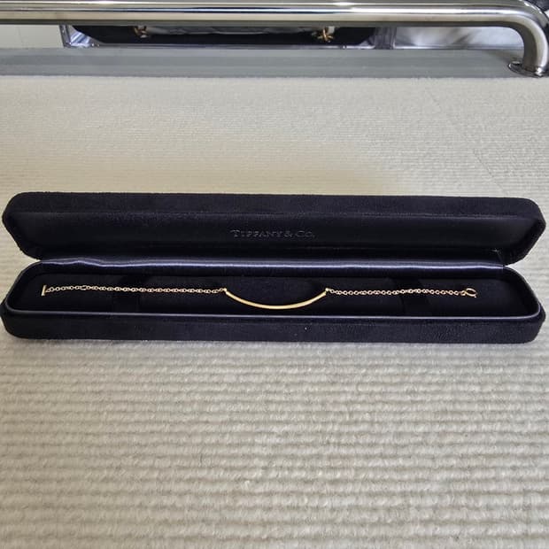 [중고/정품] 티파니앤코 T 스마일 팔찌 옐로우골드 S