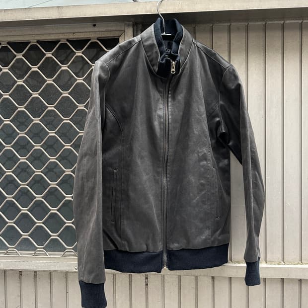 Grunge dark brown coating bomber