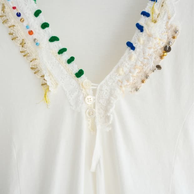 Appliqué button top