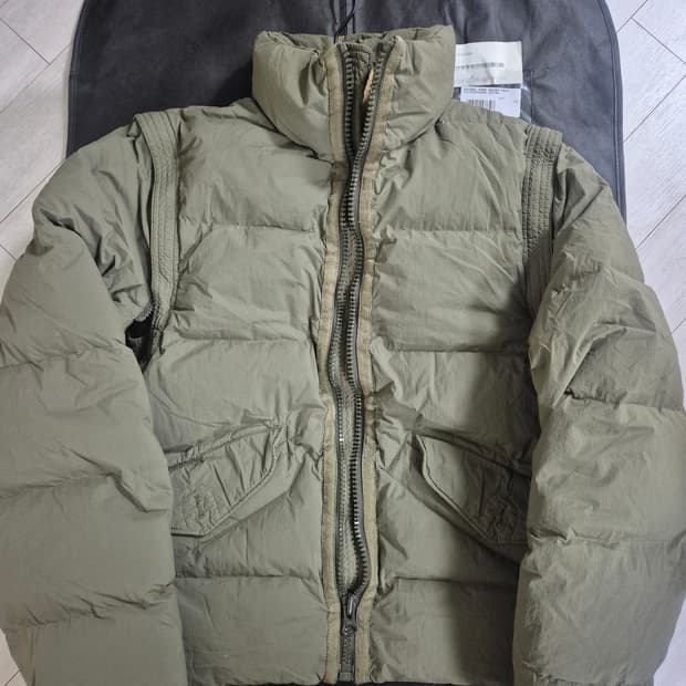 텐씨 오스트랄 다운 베스트 자켓 올리브 52사이즈