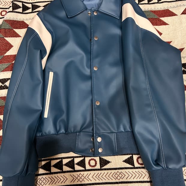 유니섹스 스티치 오버 바시티 자켓 판매