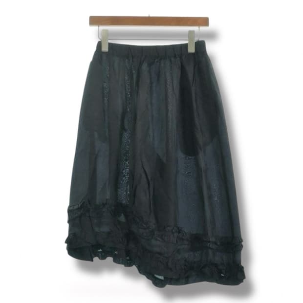 꼼데가르송 asymmetric sheer frill pants