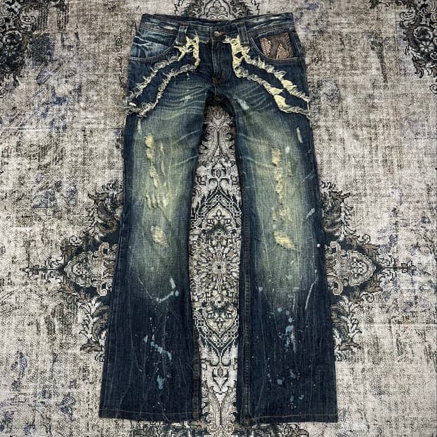 Semantic design Python paint wash jeans