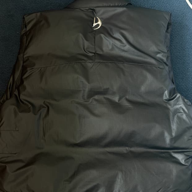 디서먼트 패딩 조끼