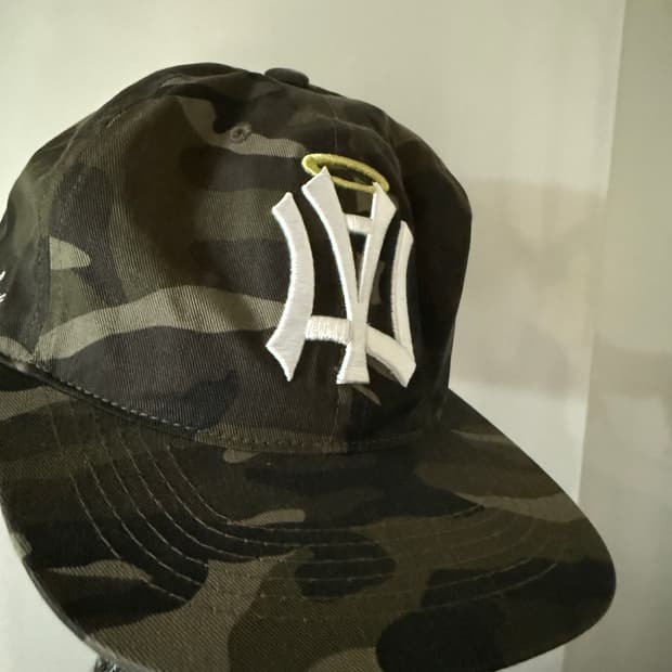 aeae SYMBOL ANGEL WING CAP [CAMO]