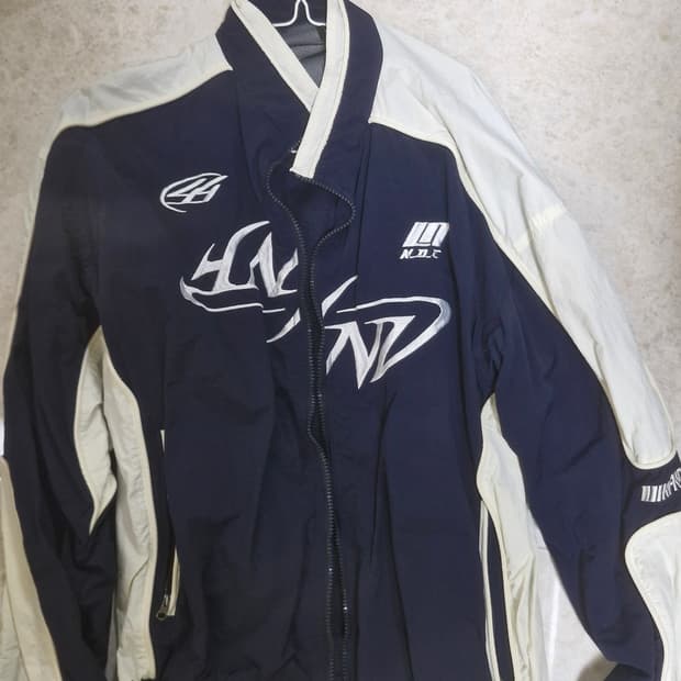 낫포너드 트라이벌 로고 나일론 레이싱 재킷 바람막이 (XL)