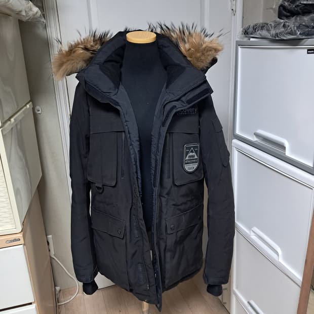 디스커버리 남성 너구리퍼 구스다운 패딩 95