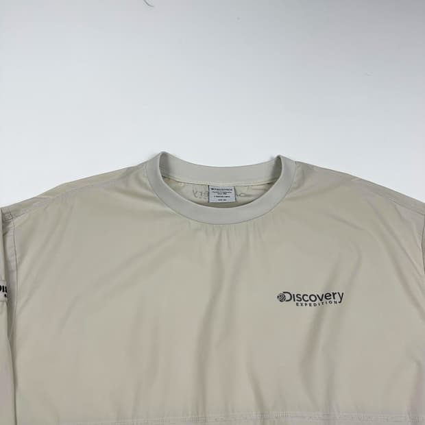 디스커버리 트레이닝 아이보리 바람막이 웜업 (XL)