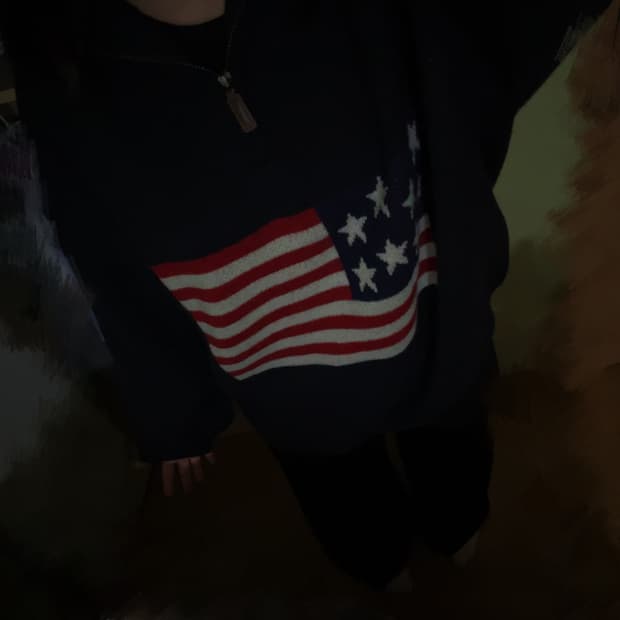 성조기 반집업 니트