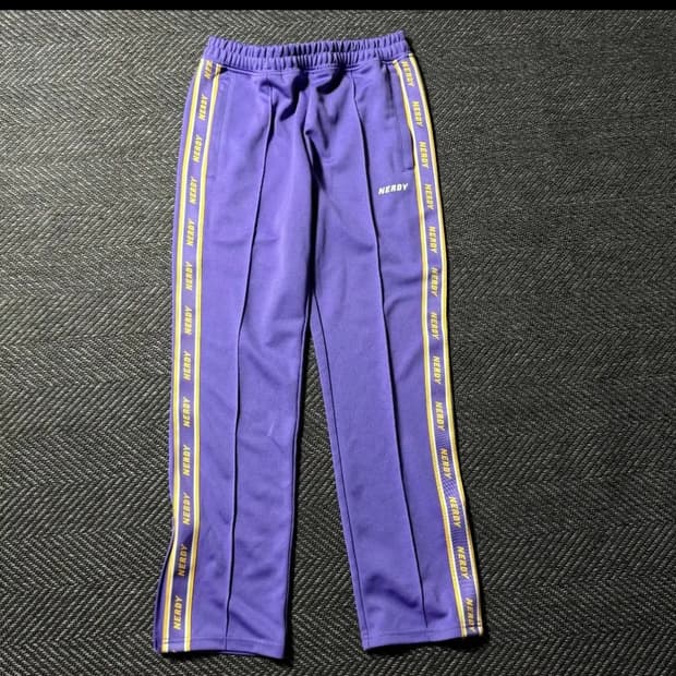 널디 NERDY 라인 트랙 팬츠 퍼플 (S)