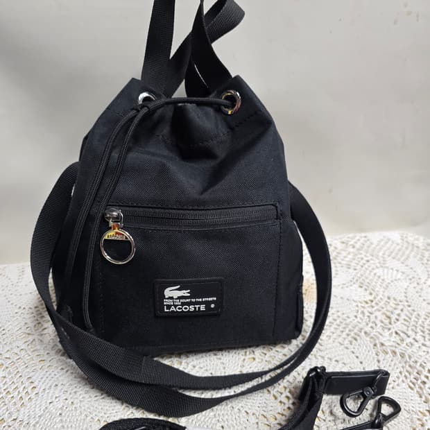 라코스테 블랙 드로우스트링 버킷백