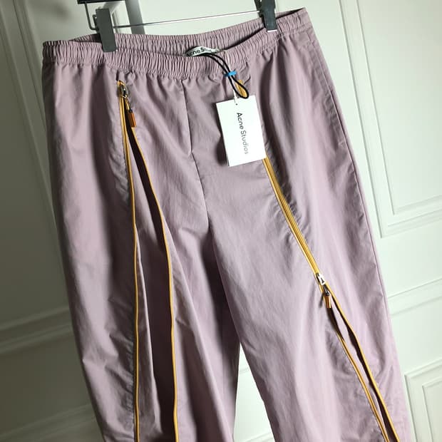 아크네 지퍼 트랙 팬츠