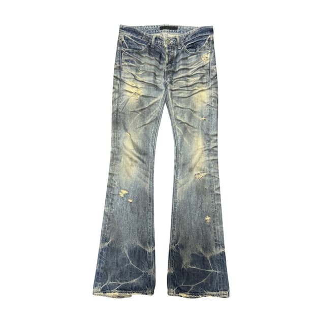 Fuga pierced distressed boots cut denim