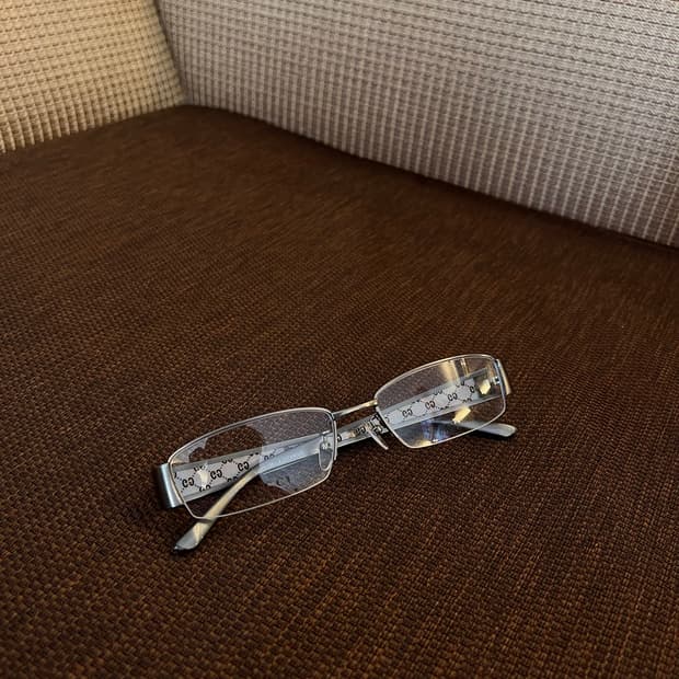 Gucci titanium glasses