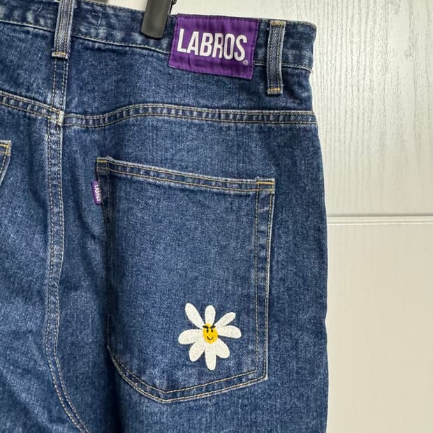 라브로스 스마트 데이지 캣 브러쉬 배기 진 인디고 L