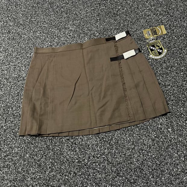 쥬시 꾸뛰르 랩 플리츠 스커트