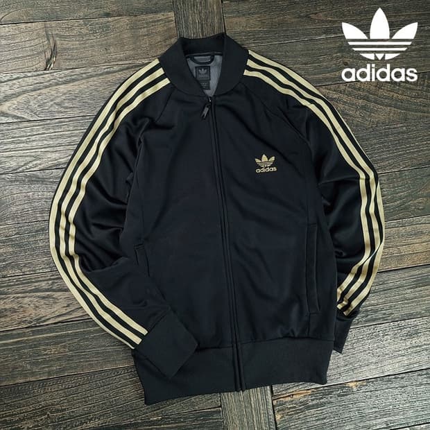 [아디다스] 슈퍼스타 져지 트랙탑 집업 자켓 블랙 골드 M19202