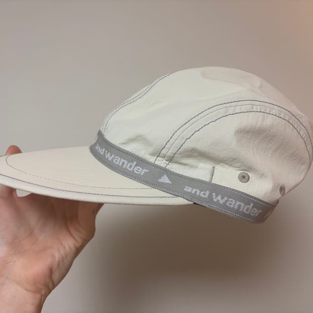 And Wander 앤드 원더 JQ 테이프캡 (오프화이트)