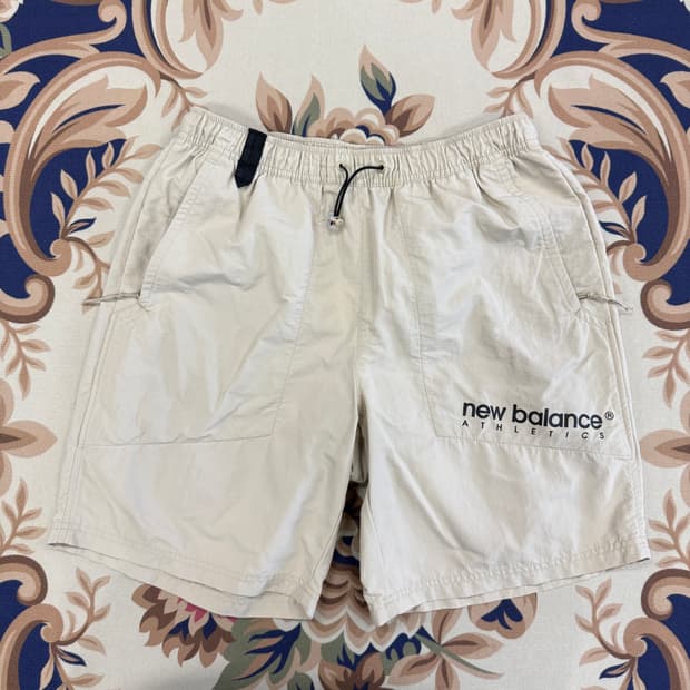 (L)뉴발란스 New balance 우븐 반바지(베이지)