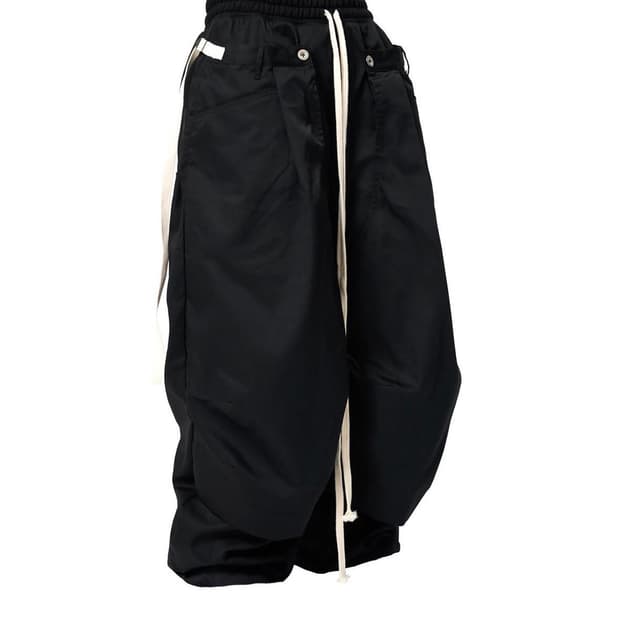 뉴치프시크dp combine layerd pants black