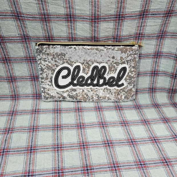 끌레드벨 스팽글 파우치 