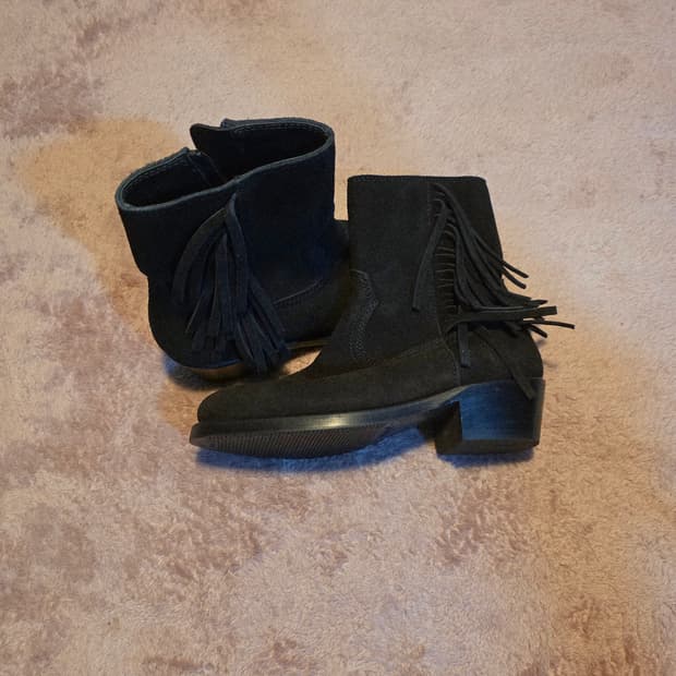 Unused fringe boots
